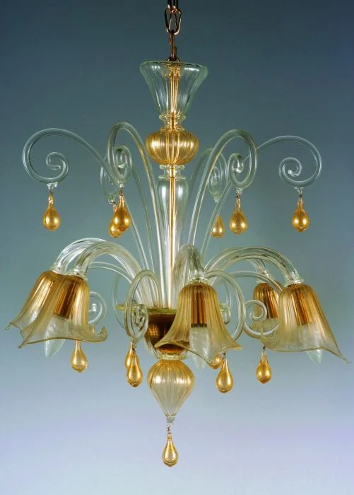 Minimalist Chandeliers for Sleek and Simple InteriorsGold and crystal droplet chandelier Minimalist Chandeliers for Sleek and Simple InteriorsGold and crystal droplet chandelier