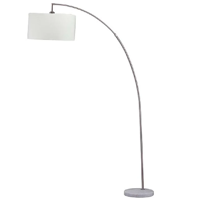 Glass Floor Lamp with Frosted Shades for Soft Diffused LightFloor Lamp With Curved Metal Frame And Drum Shade, Silver By Benzara Glass Floor Lamp with Frosted Shades for Soft Diffused LightFloor Lamp With Curved Metal Frame And Drum Shade, Silver By Benzara