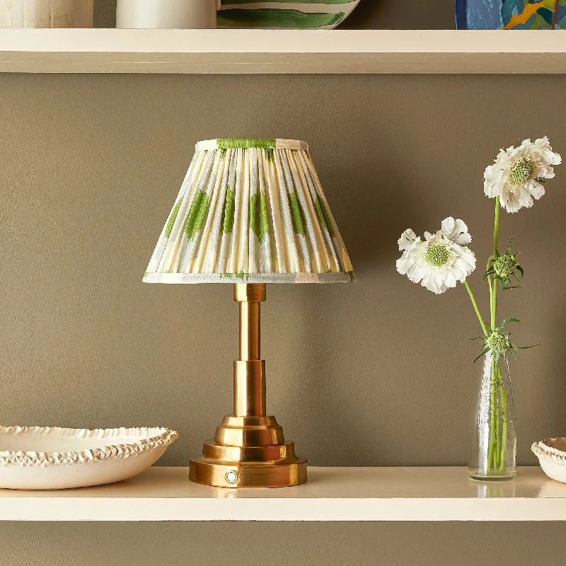 glass table lamps with a frosted surface for soft light diffusionErnest cordless table lamp in antiqued brass