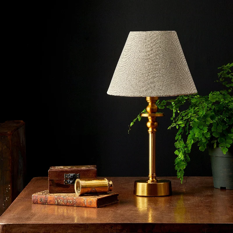 rustic farmhouse table lamps for cozy kitchensPhileas cordless table lamp in antiqued brass by Matthew Williamson rustic farmhouse table lamps for cozy kitchensPhileas cordless table lamp in antiqued brass by Matthew Williamson